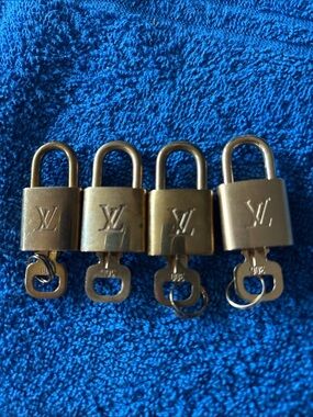 Louis Vuitton Gold Tone Padlock Set of Four